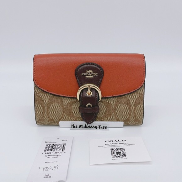 Coach Handbags - Coach C7374 Kleo Wallet In Signature Canvas Gold Khaki Multi NWT Org $250
